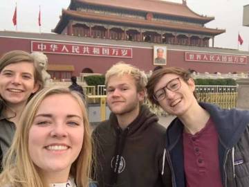 Charles Synder (center) in China