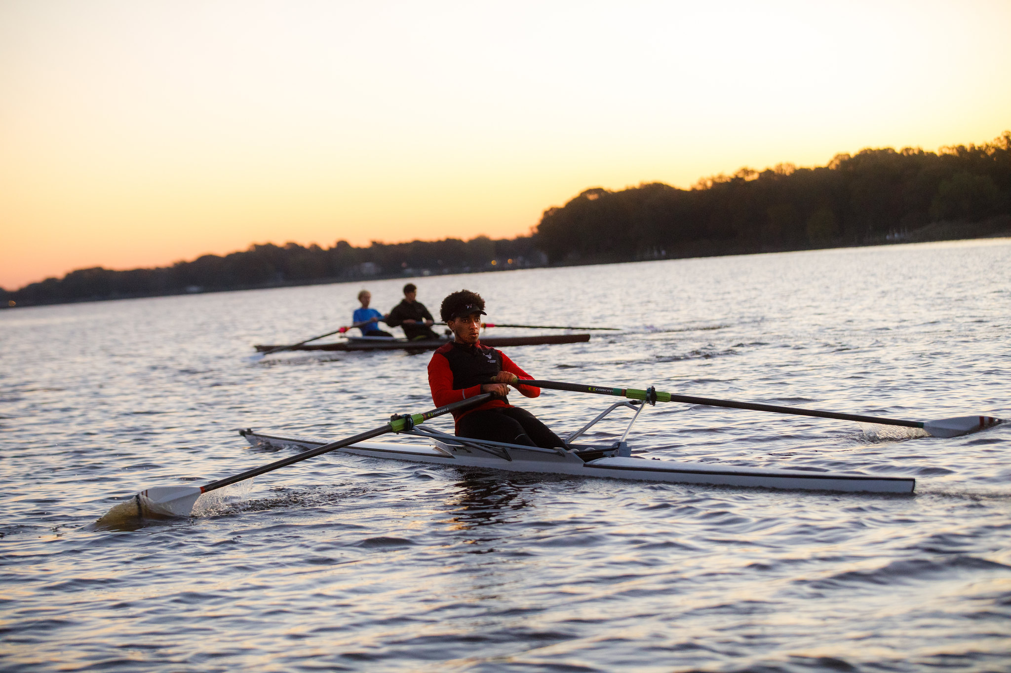 Washington College undergrad rower rows on the Chester River