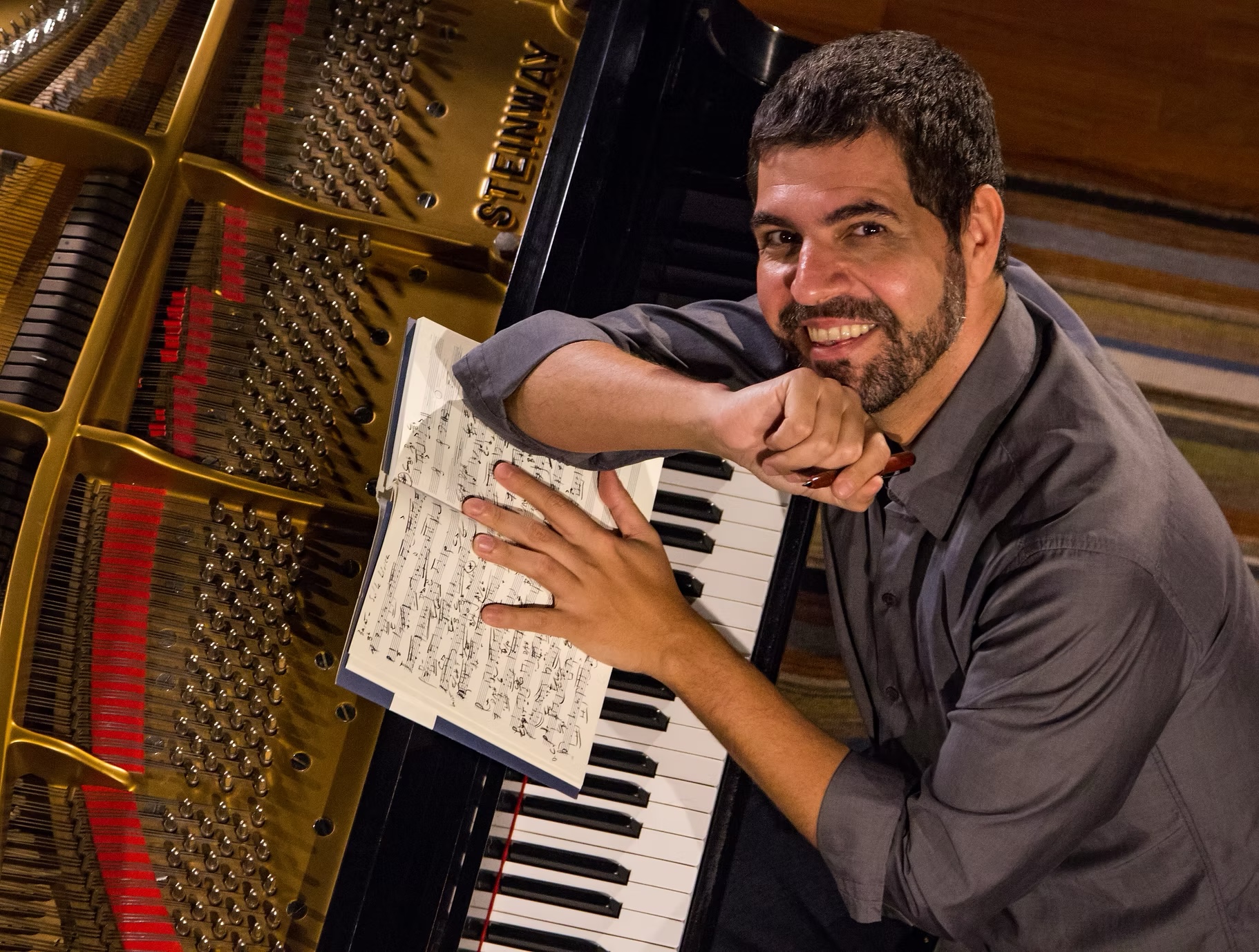 Man Sitting at Piano
