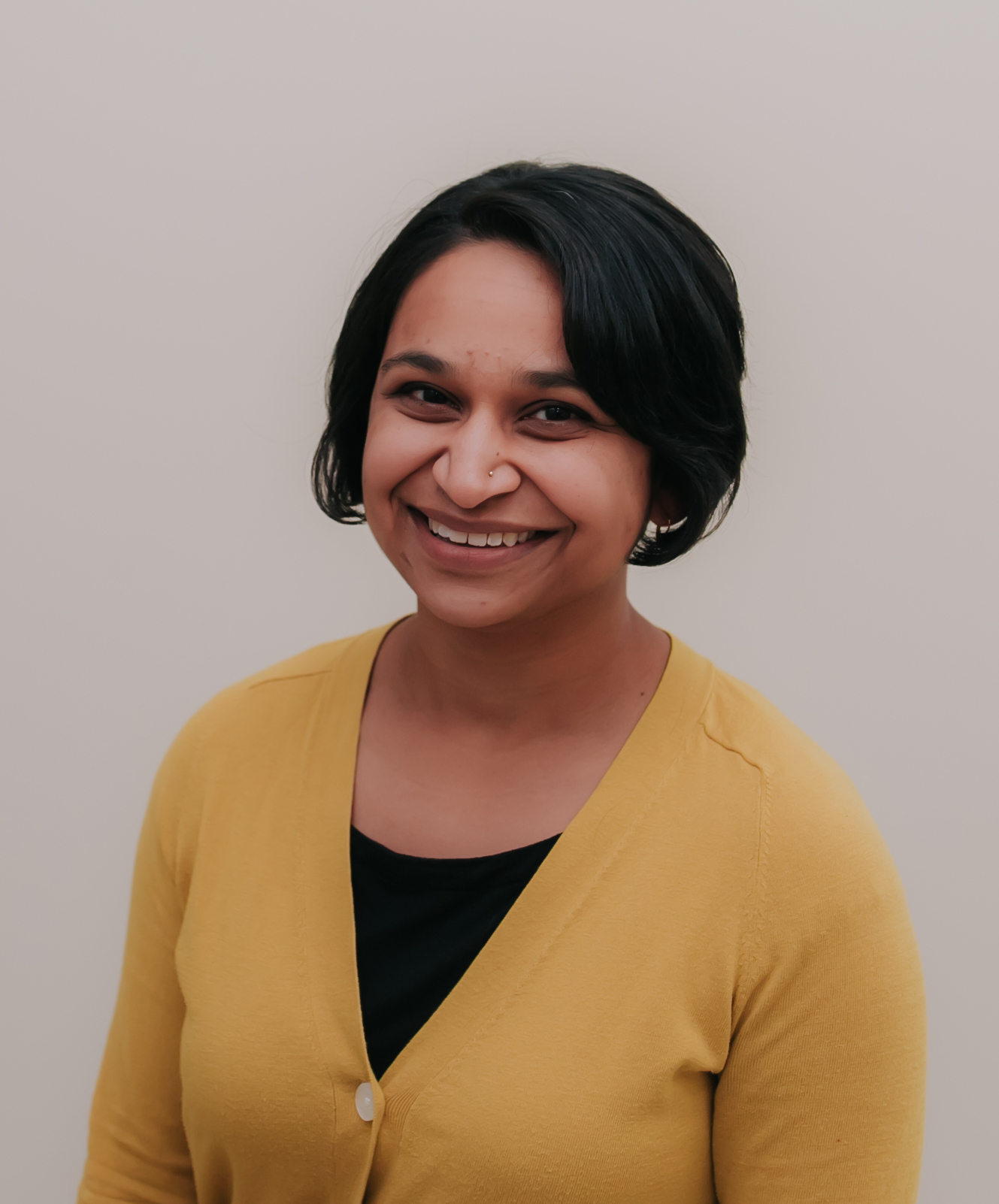 Professional headshot of Mala Misra