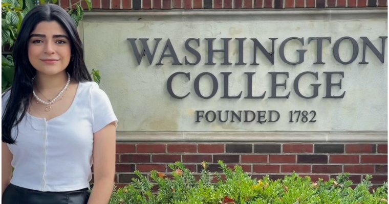 Denisse Rojas Maldonado in front of Washington College entrance