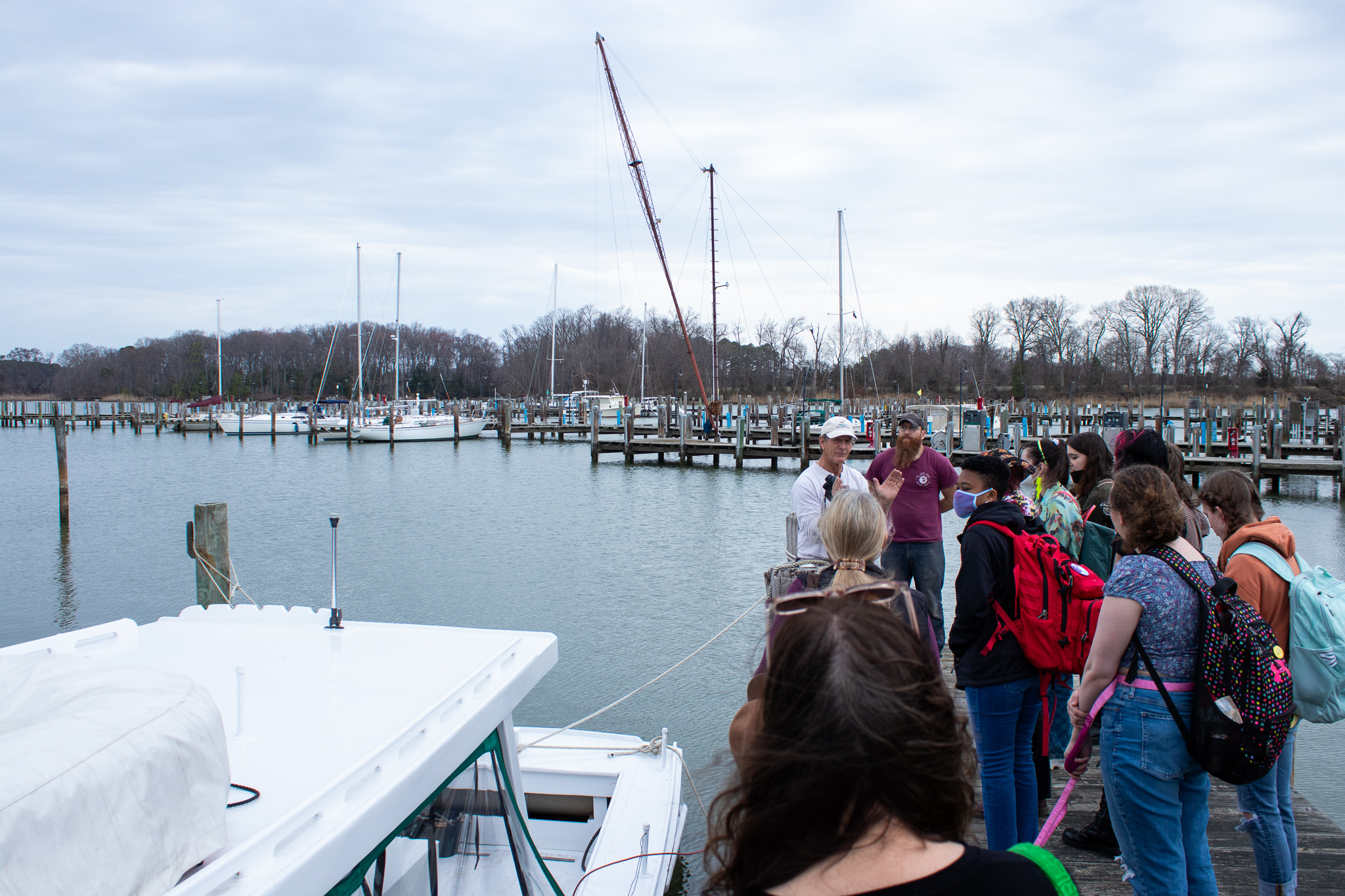 Ecopoetry students gather on the dock for a field trip with Echo Hill Outdoor School