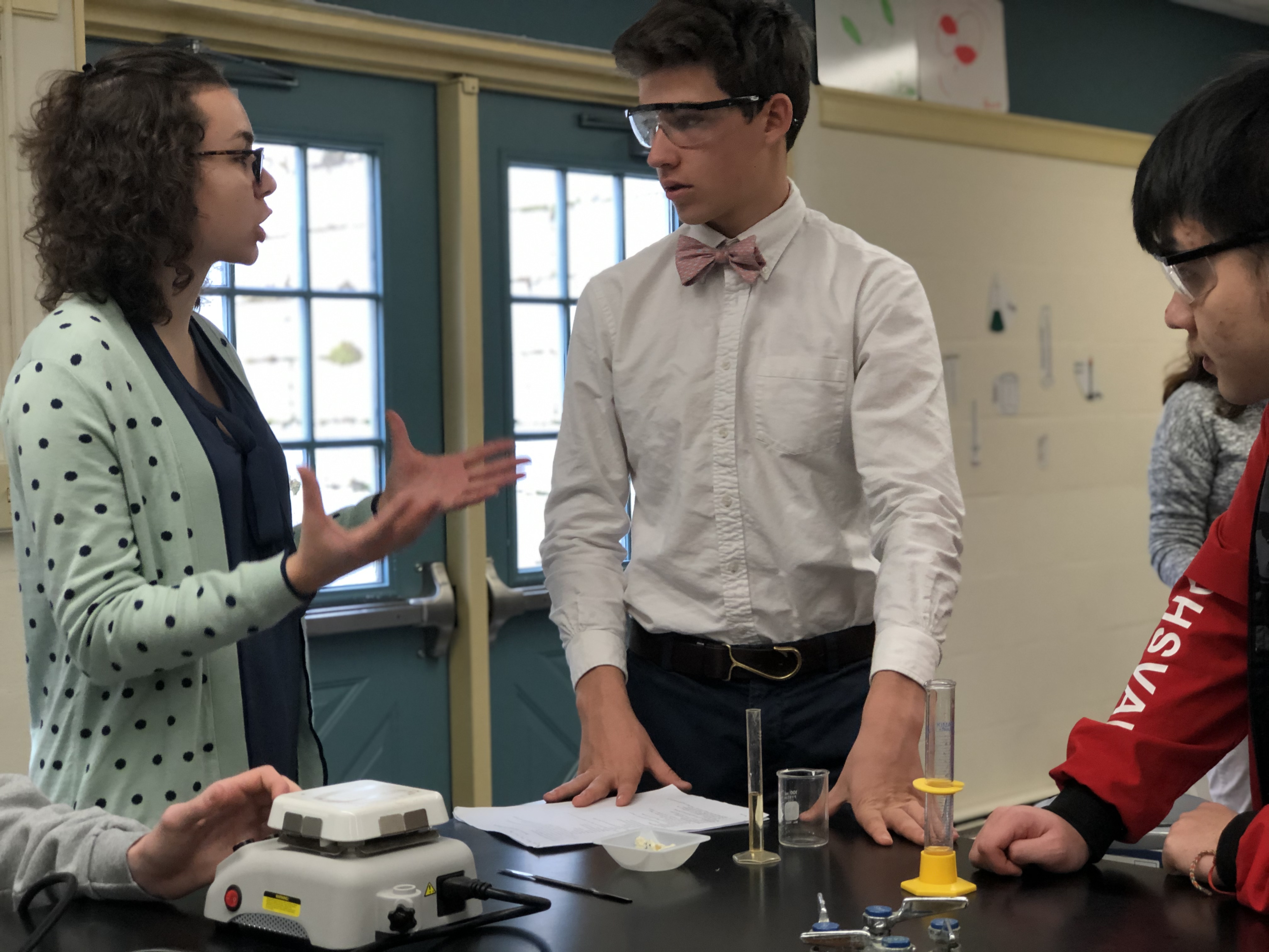 Ellie (left) teaching a student 