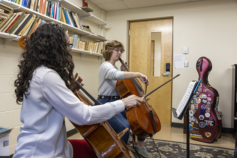 Sarah Poirier '24 practices her cello in a Washington College music room.