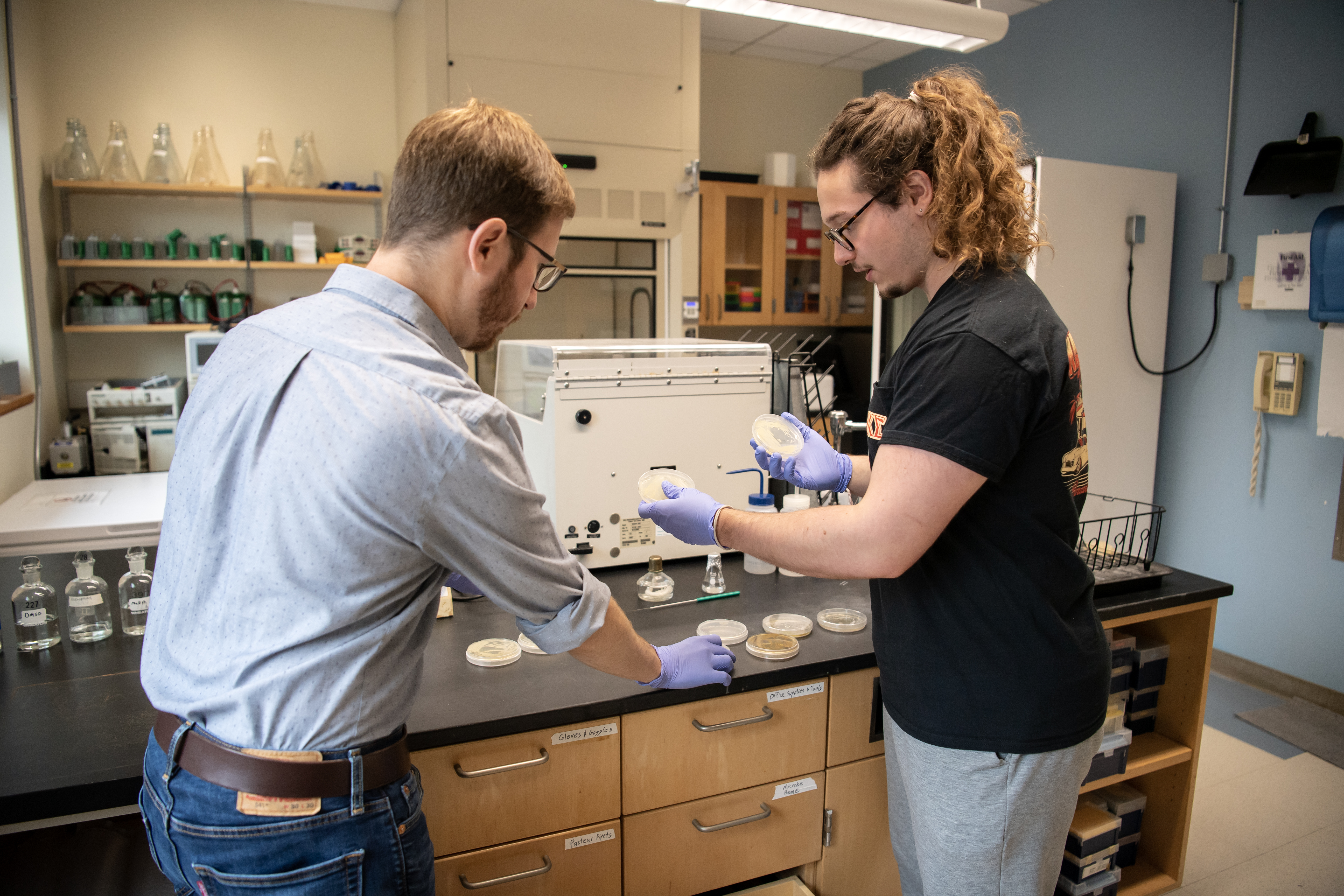 Estes and May working in lab