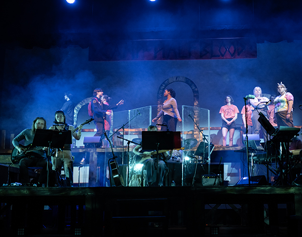 students perform on the Decker stage