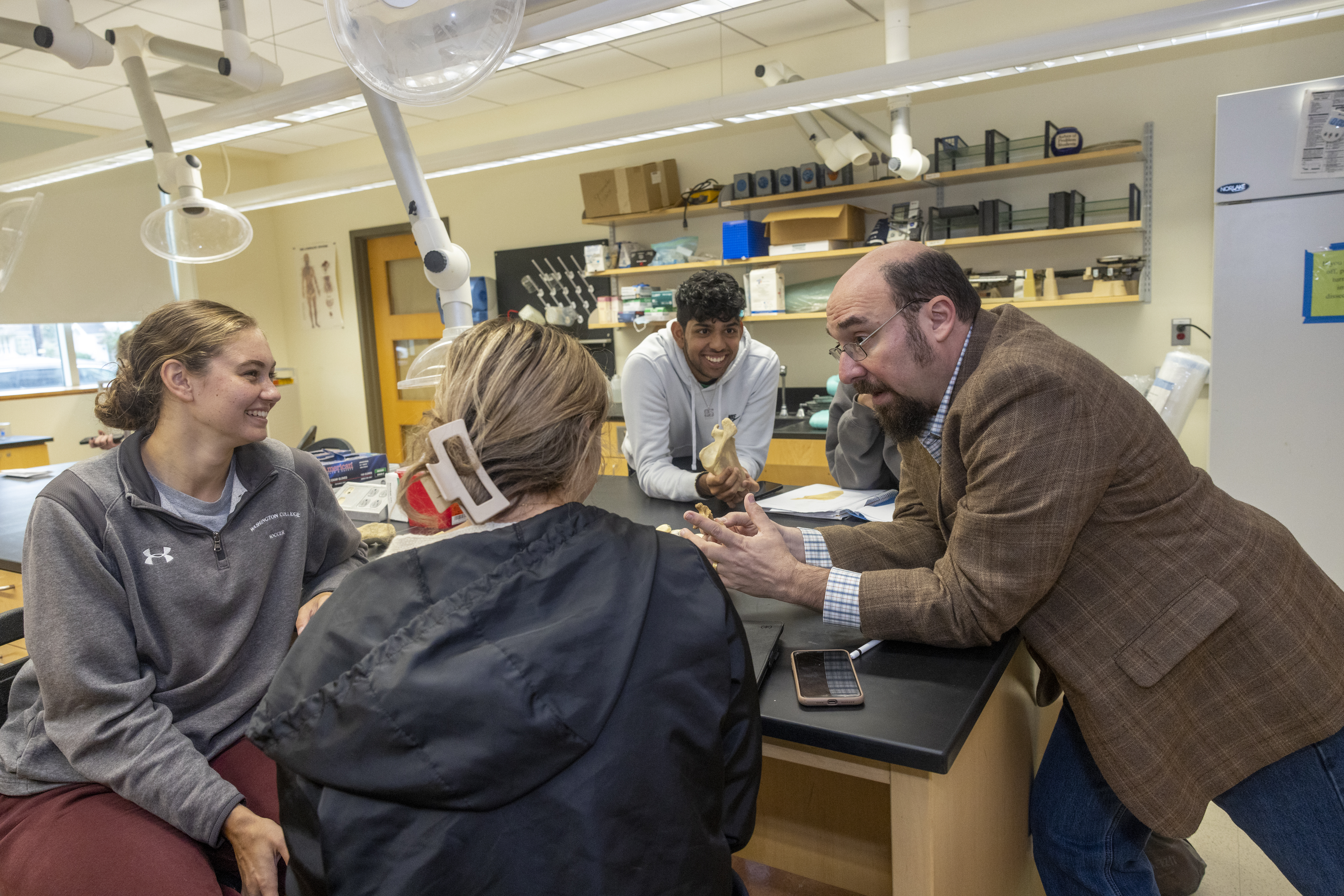 Washington College students in anatomy lab with professor
