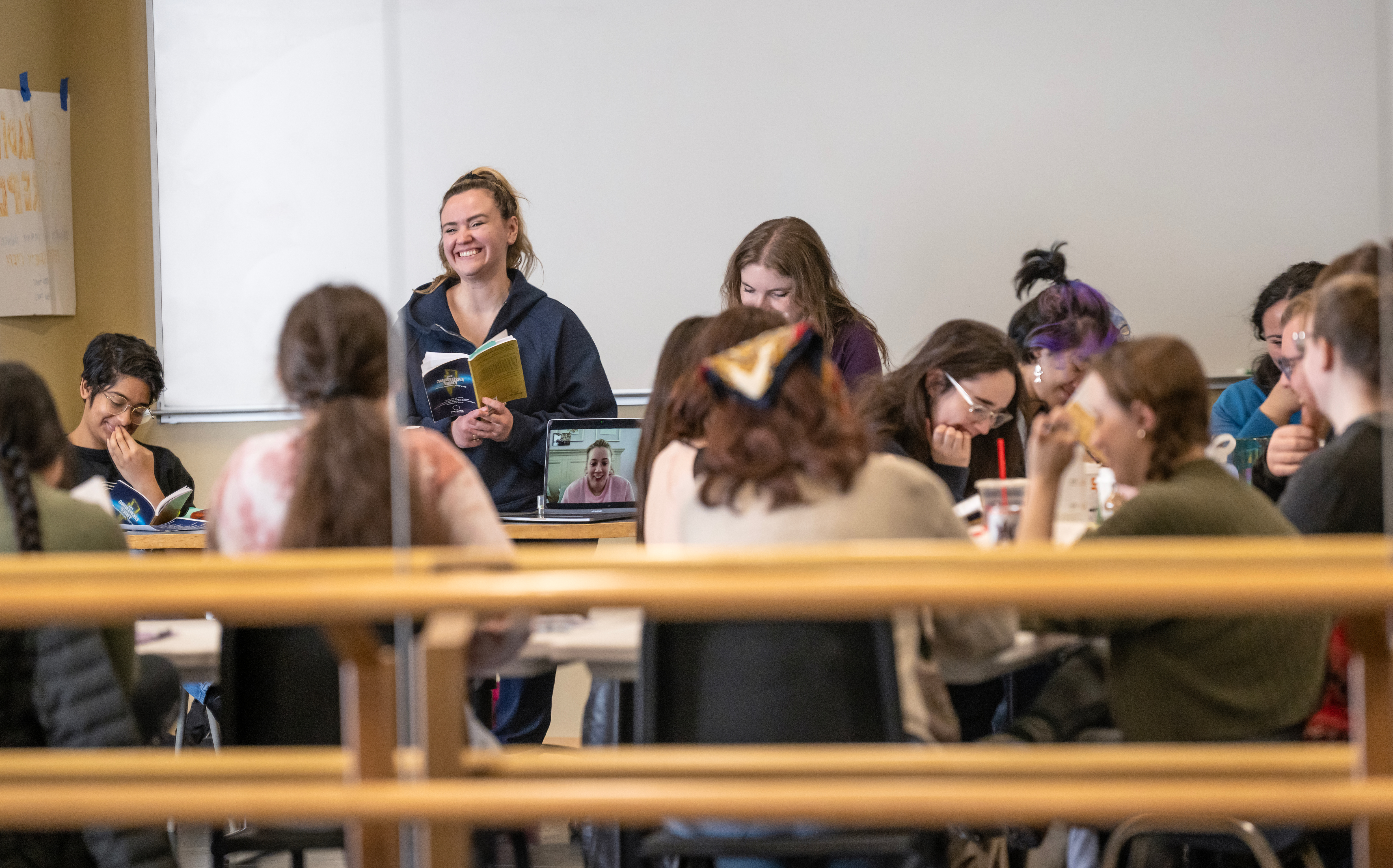 Students in a classroom reading for theatre