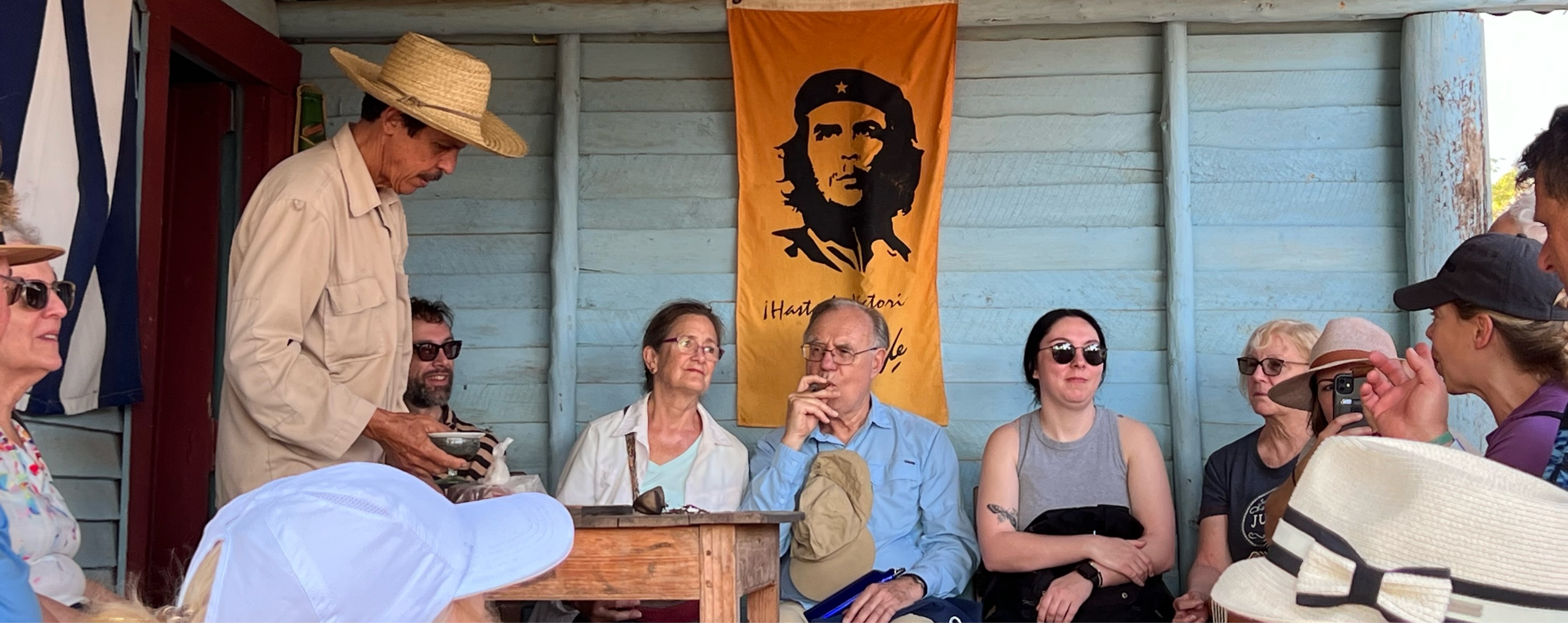 A group of people listening to speaker
