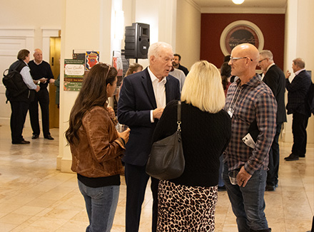 parents and College staff mingle at a reception