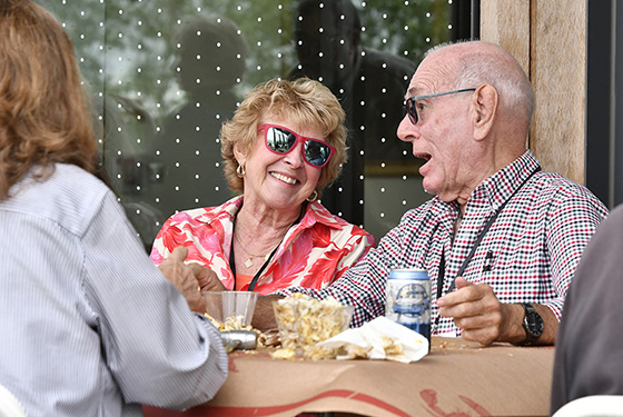 Alumni talking at a reception