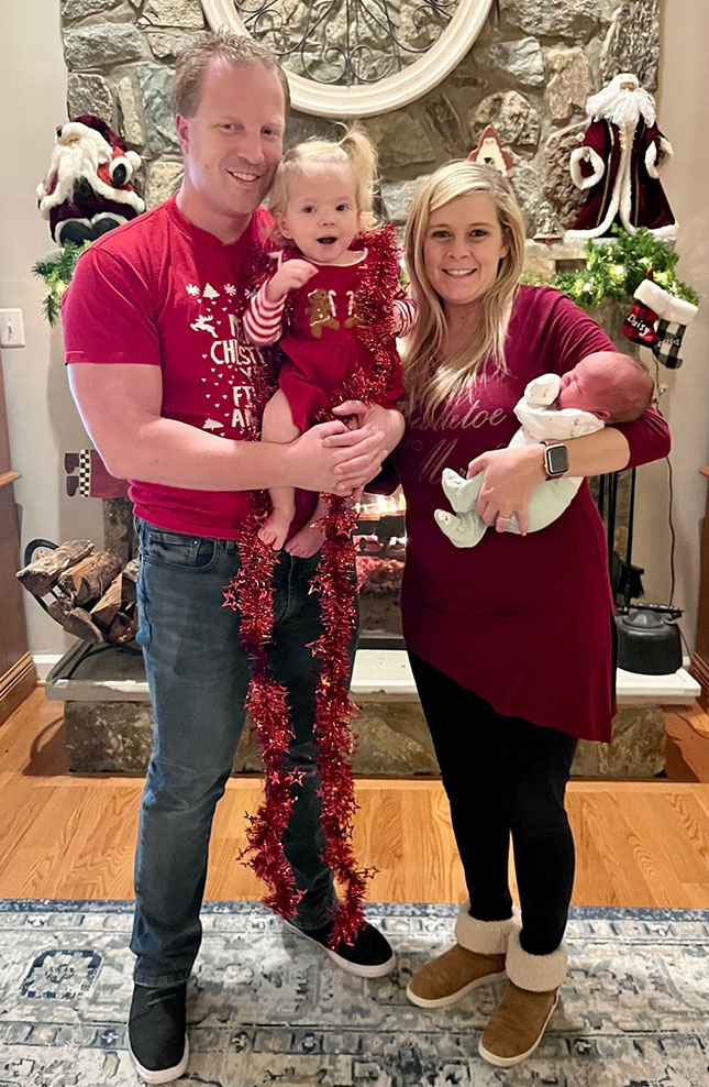 Darren Colananni and his wife Kristen with their children