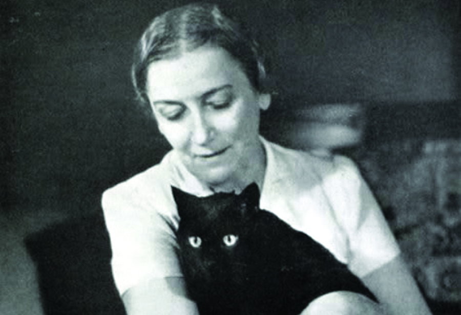 Sophie Kerr holding one of her cats