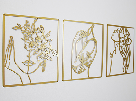 metal art in three panels