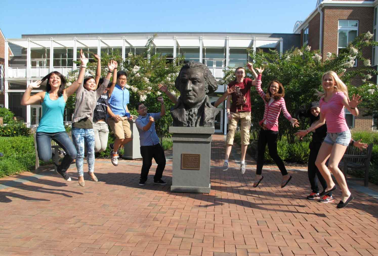 A group of students jumping in the air