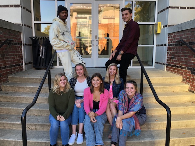 WAC-squared counselors pose on stairs