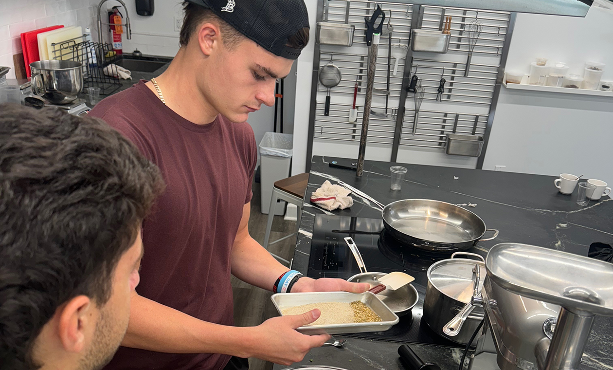 Students in a commercial kitchen
