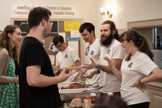 Kappa Sigma brothers and friends serve pancakes during a fundraiser for military veterans