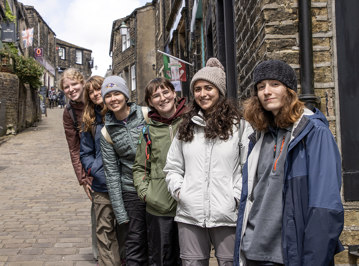 Students on an English cobbled street