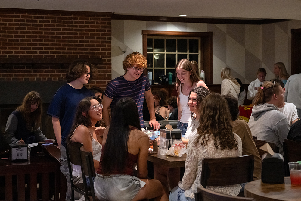 students hang out in the campus pub