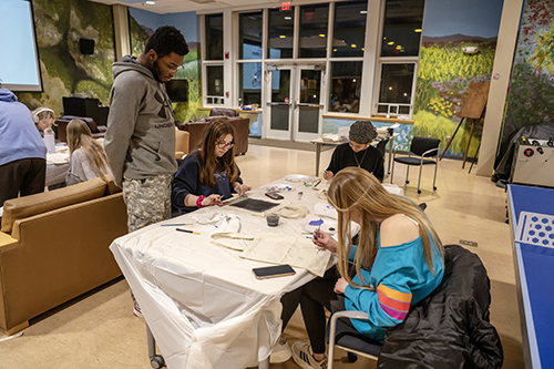 students completing a craft