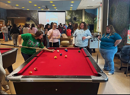 the sisters of aoii and zta play pool together