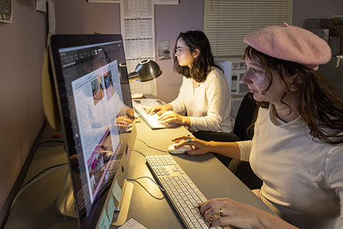 student editors working on the elm