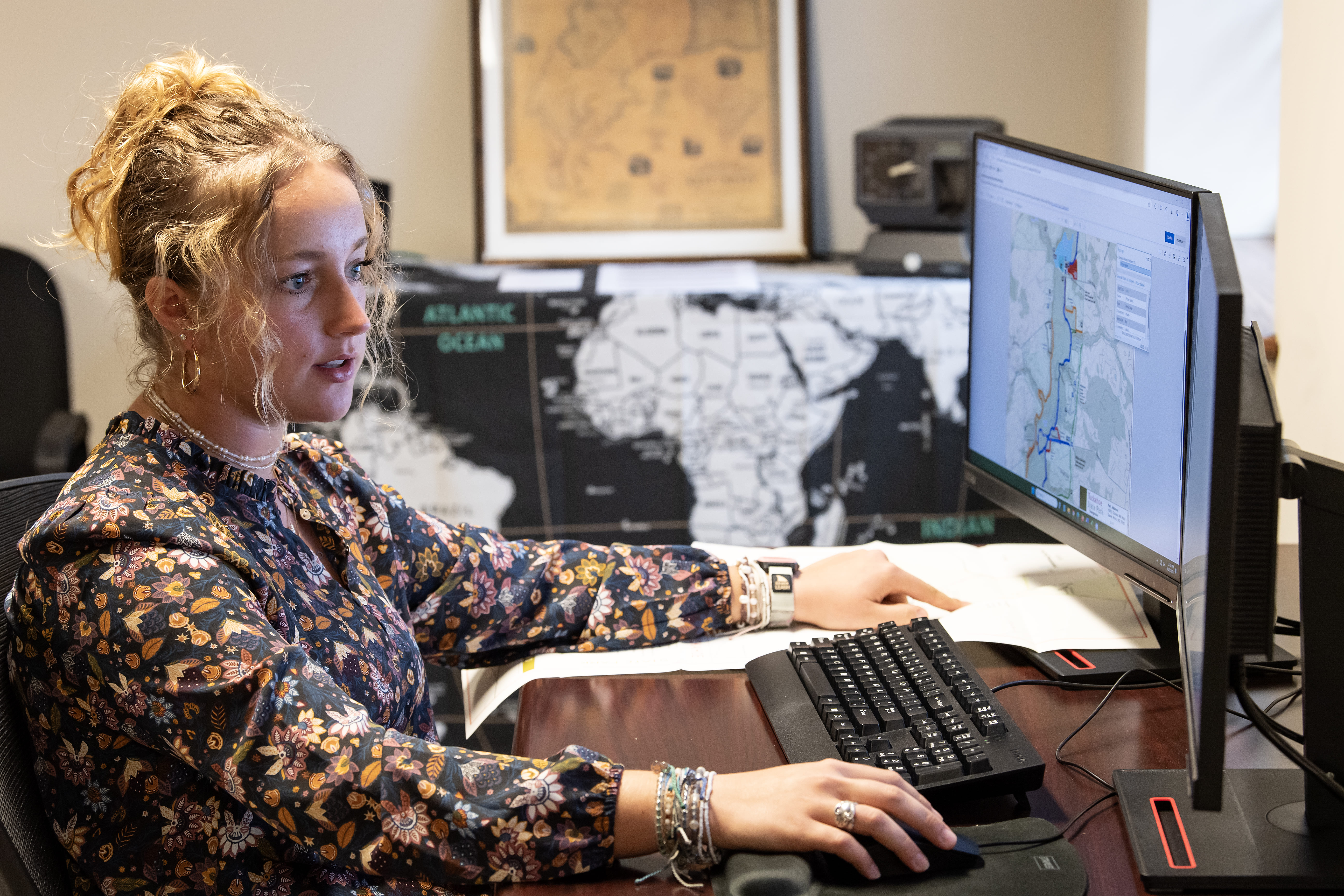 GIP member sitting at computer