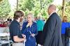 College Trustee Ann Horner greets rower Alex Kincaid and Director of Athletics Thad Moore.