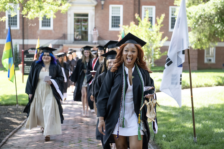 Graduates of the class of 2025 make their way to the commencement ceremony at Washington College. 