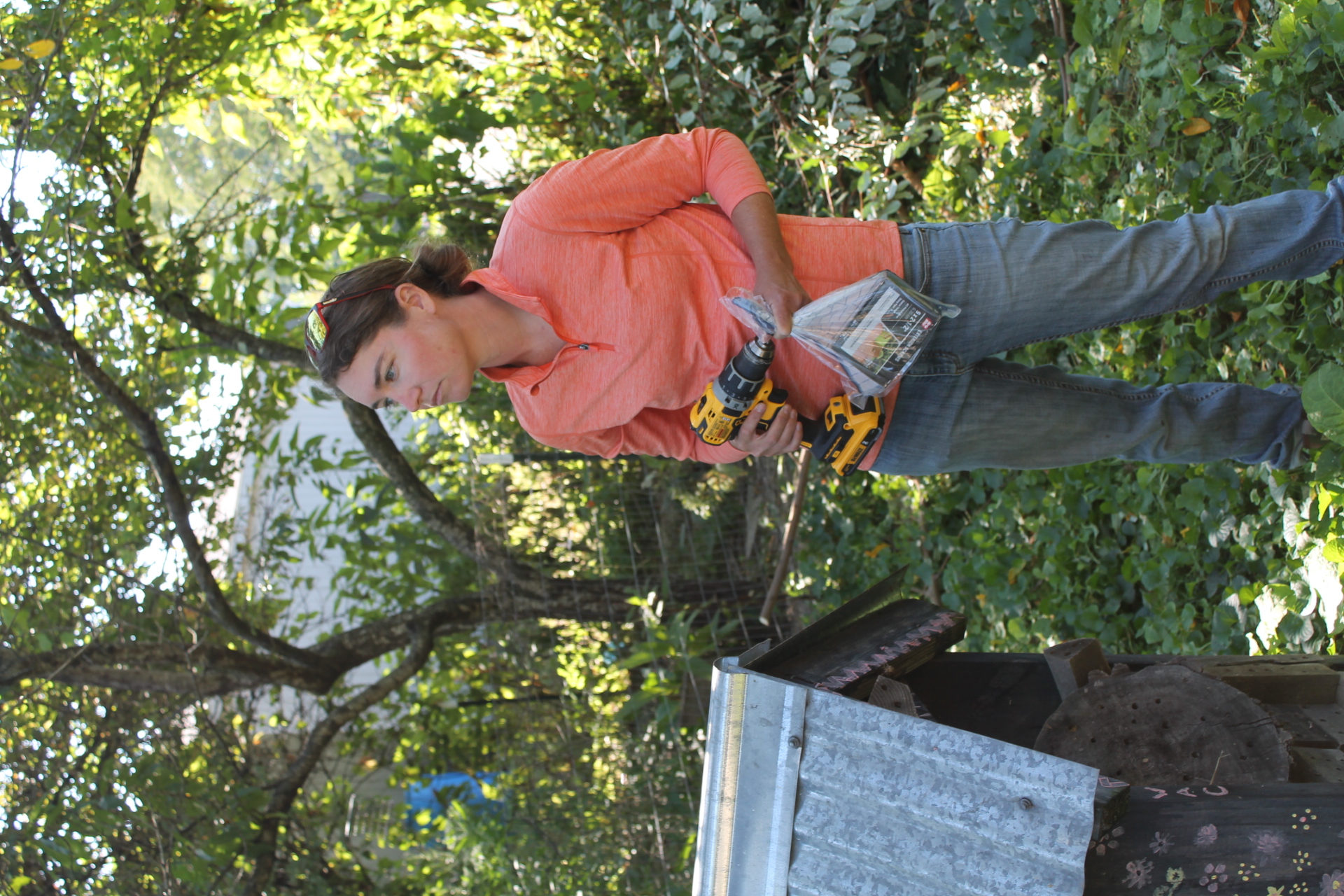 Kathy Thornton works in the Washington College Campus Garden. 