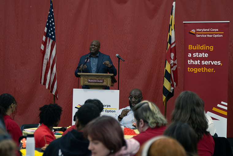 Washington College VP of Enrollment Management Johnie Johnson announces the scholarships to the DSCI service Memebers. 