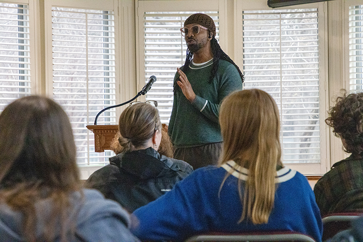 jericho brown leading a workshop on the poetic form in invented, the duplex, on the lit house porch