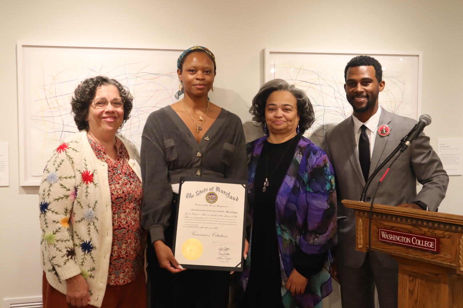 Mason descendants Zoë Angenette Vilicic, Nia Holley, and Cheryll Toney Holley with Starr Center Deputy Director Jason T. Moaney. 