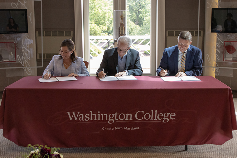 The leaders of Kent County Public Schools, Washington College, and Queen Anne’s County Public Schools sign the new memorandum of understanding.