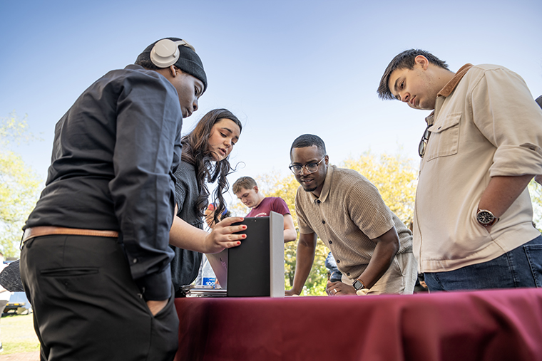 photo of darius johnson working with students