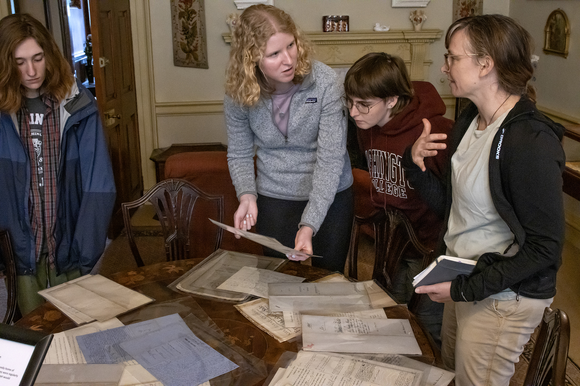 students looking at historic documents