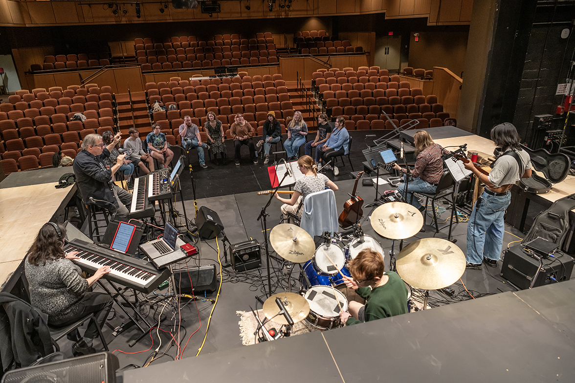 student rehearse on stage in Decker Theatre