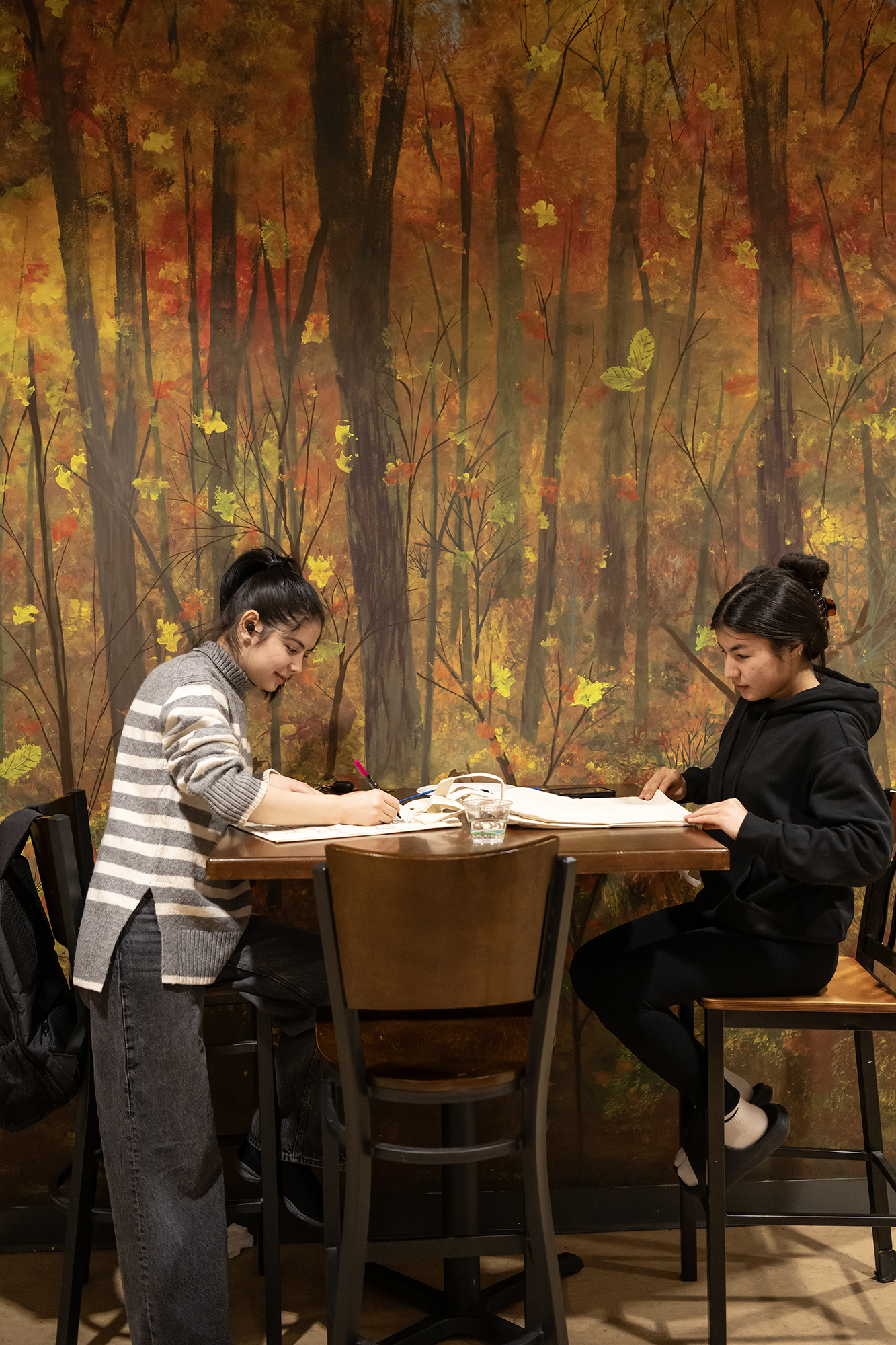 students painting in craft night
