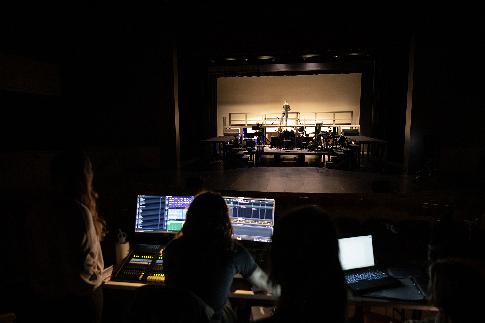 student working on lighting