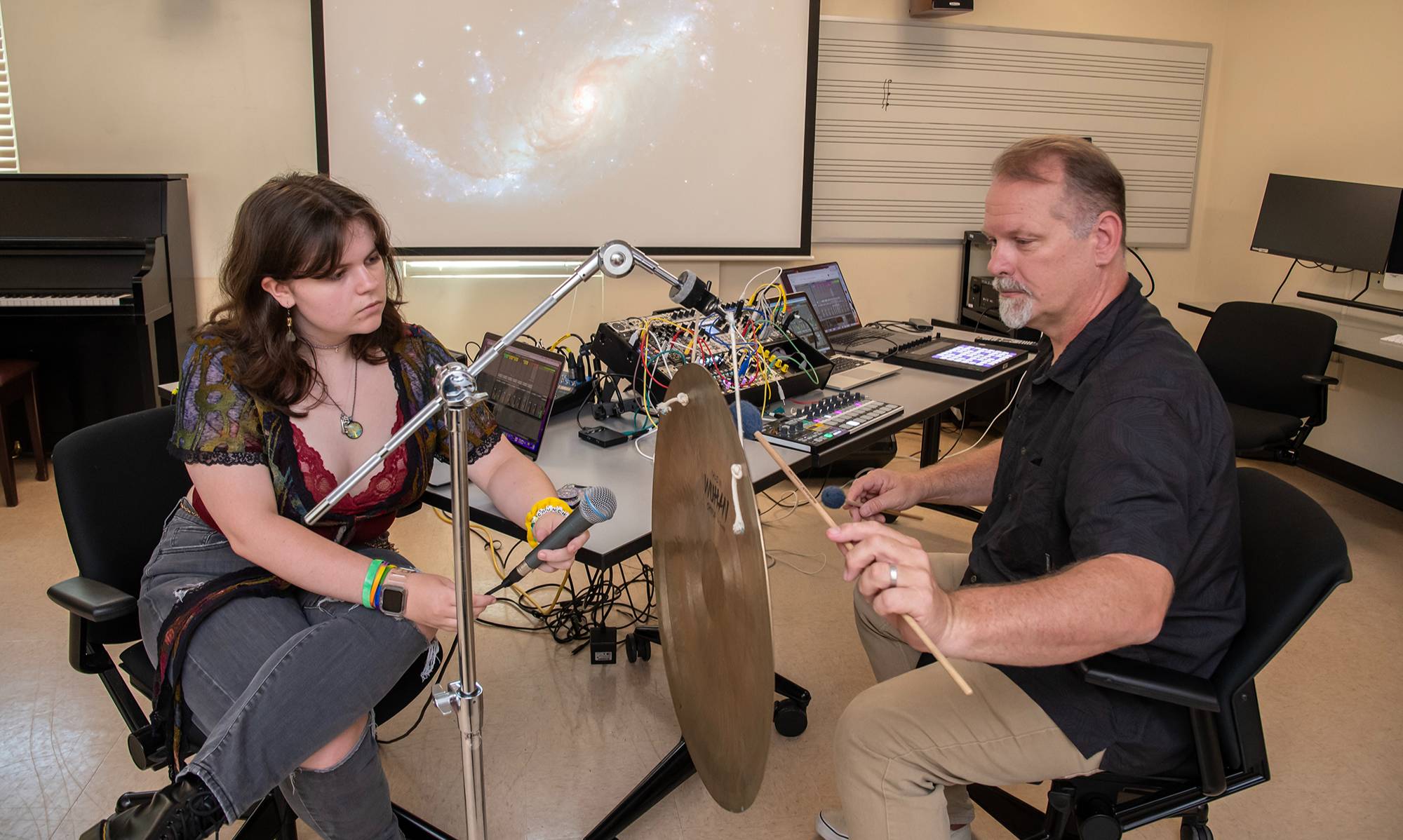 student and professor collaborating