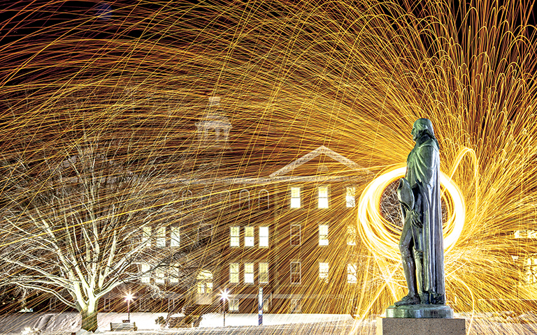 George Washington statue with long-exposure of lights