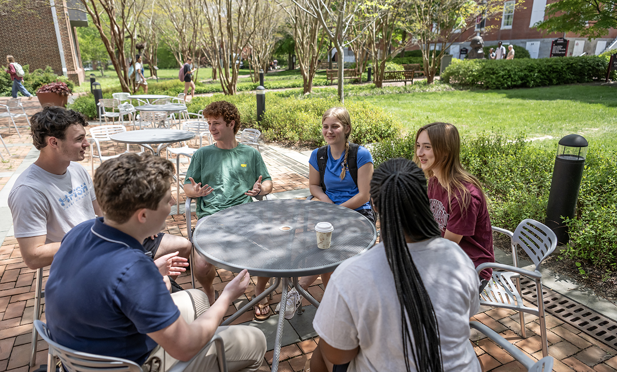 students on patio outside Hodson
